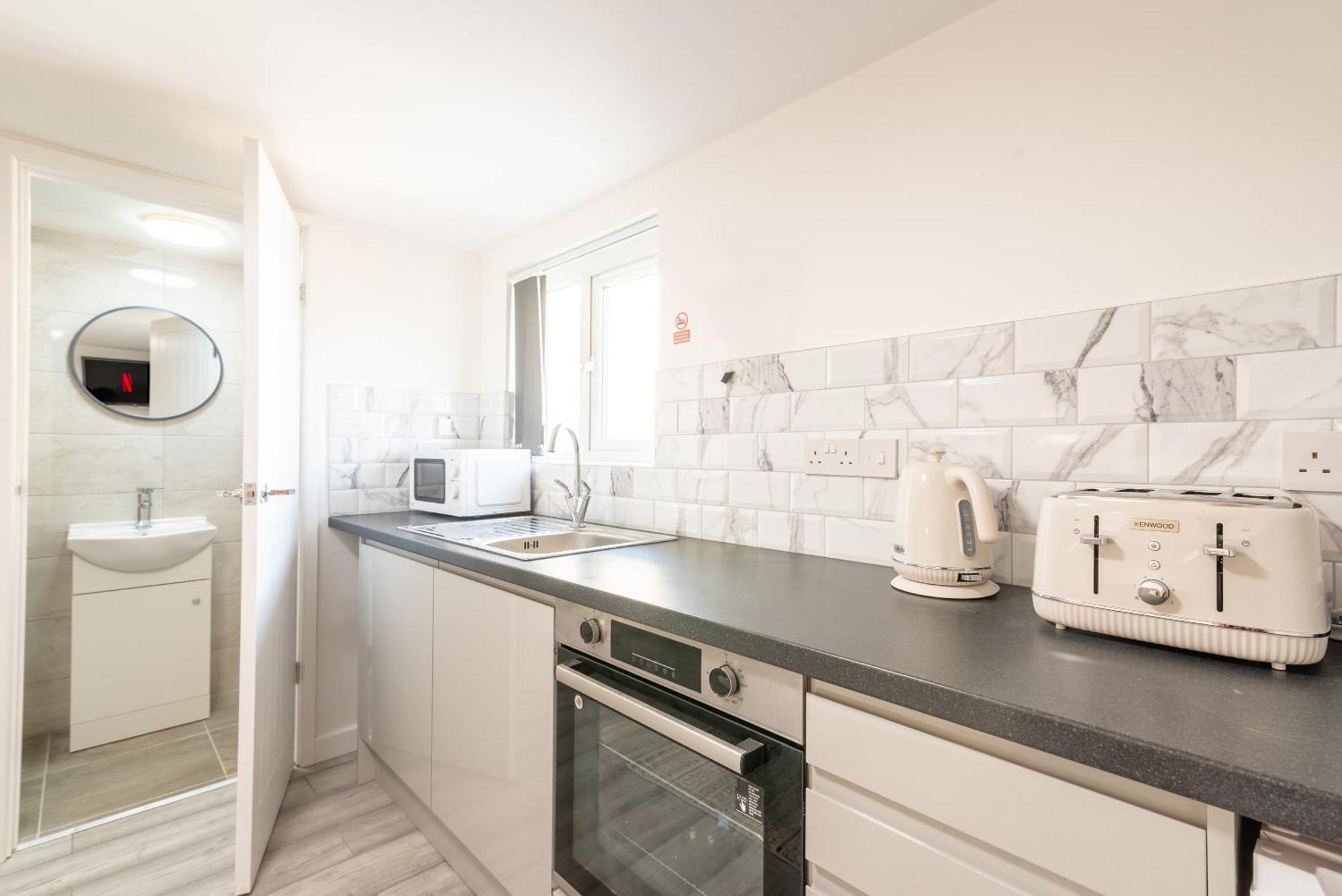 Cosy Cardiff Apartments - Garden Lounge Bagian luar foto
