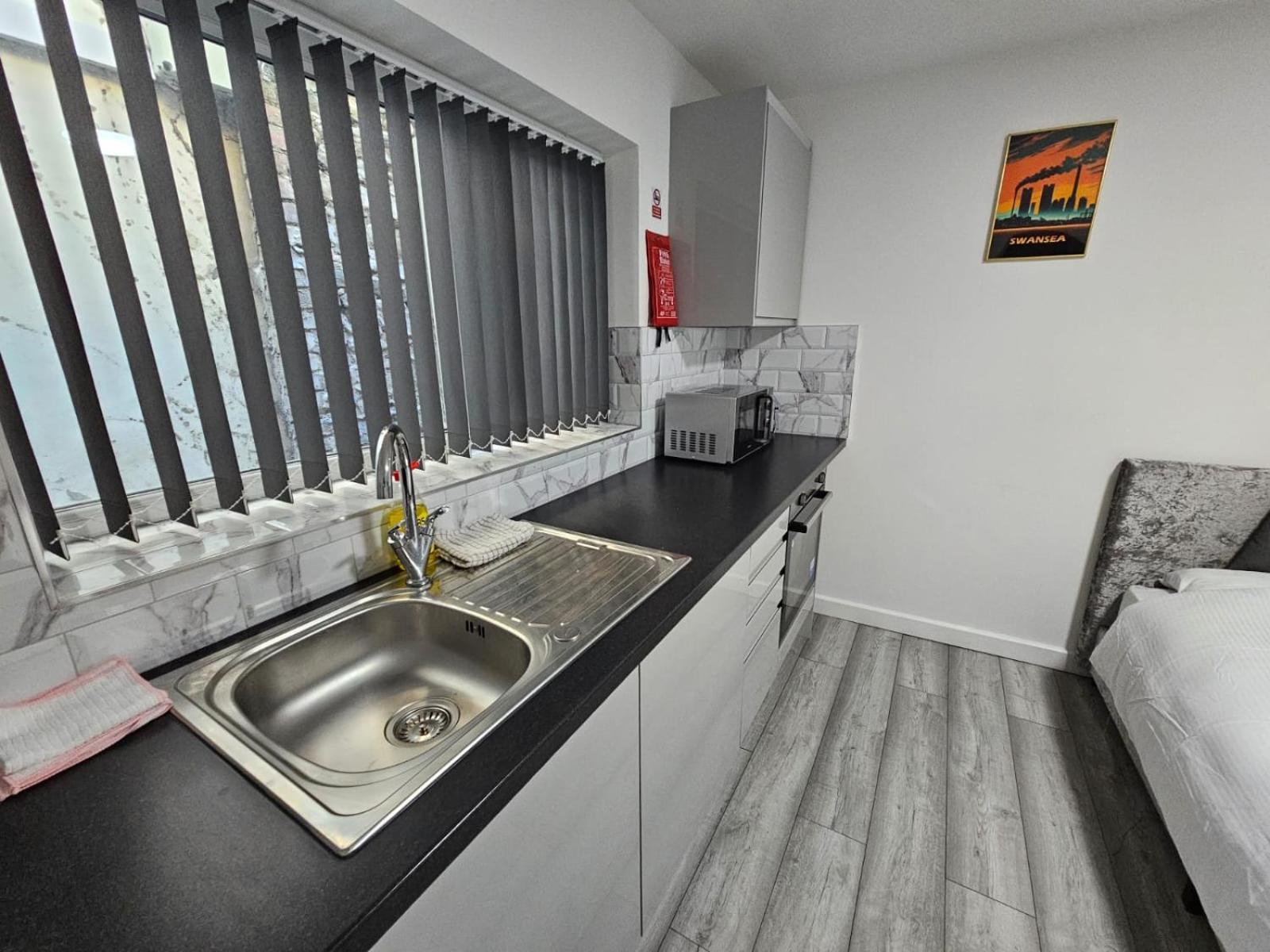 Cosy Cardiff Apartments - Garden Lounge Bagian luar foto